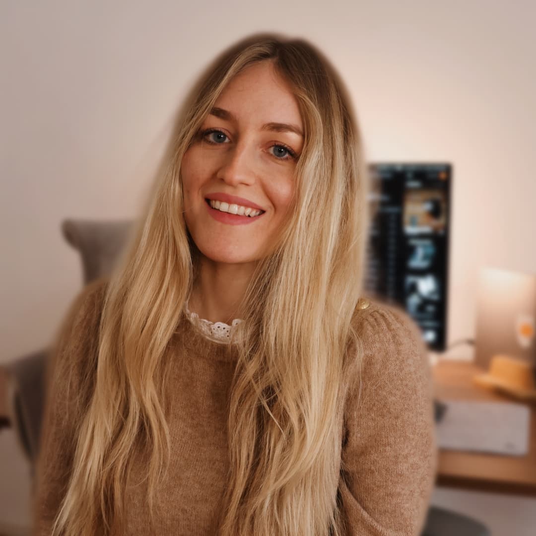 Headshot of Olga, CRO specialist and full-stack software engineer